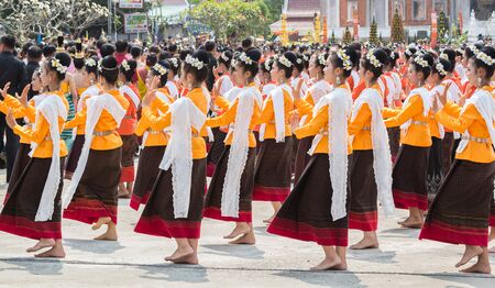 Dance of Buddhist worship. Phra That Na Dun  February 20, 2016 Mahasarakham, Thailand.のeditorial素材