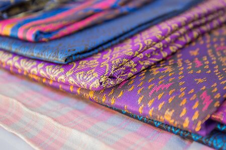 Thailand silk woven by hand, which expresses the identity of the people of Thailand are placed...