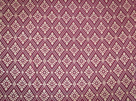 Thailand silk woven with motifs like flowers in the squares of many flowers that expresses the identity of the people of Thailand.の写真素材