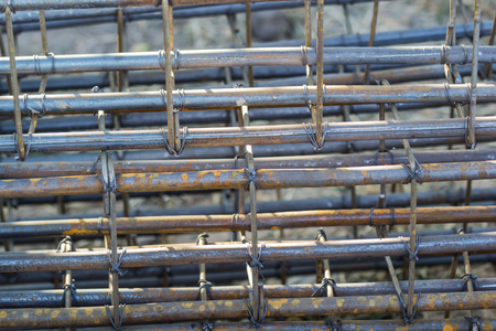 Steel bars that bind together for use in building construction.の写真素材