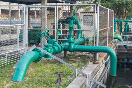 Large green water valve that controls the opening and closing of the reservoir.の写真素材