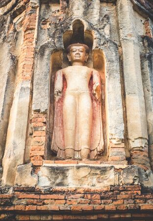 The old Buddha statue in Lamphun, Thailand. (This statue is located in public area.)の写真素材