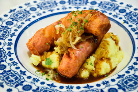 Fried Sausage with sweet potatoの写真素材