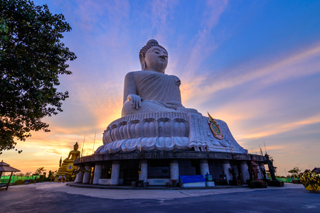 Big buddha in Phuket Thailand wiht sunset and color of skyの写真素材