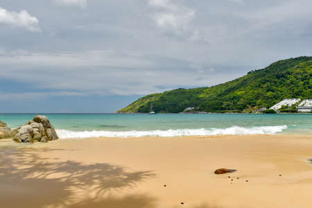 Beautiful wave on the beach, clear water, white sand in your holliday at andaman sea Phuket Thailand.の写真素材