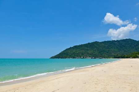 Beautiful wave on the beach, clear water, white sand in your holiday at Khanom beach Nakhon si thammarat Thailand. 
Golden sand, white waves and beautiful sea. Good for relaxingの写真素材