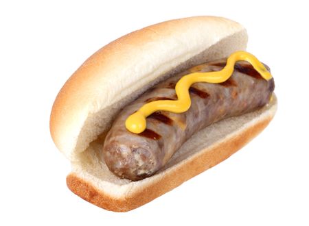 Grilled bratwurst on a bun with mustard isolated on whiteの写真素材