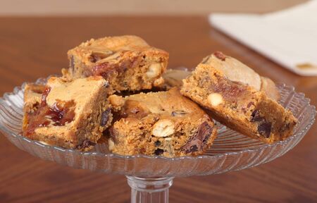 Pieces of peanut butter fudge on a glass plateの写真素材