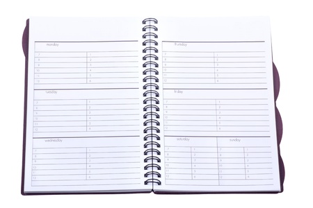 Opened weekly planner isolated on a white background