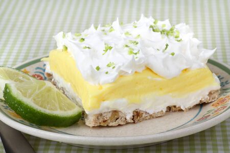 Lemon lime pudding dessert with a lime sliceの写真素材