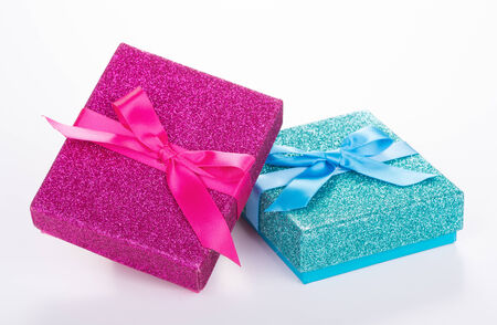 Pink and blue gift boxes on a white backgroundの写真素材