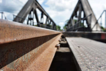 Low angle the railway track on the River Kwai bridgeの写真素材