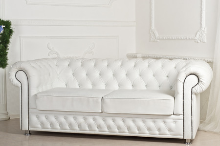 Studio sets with a leather sofaの写真素材