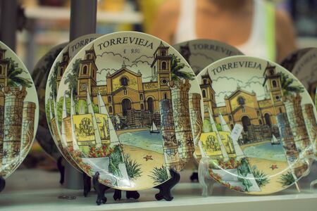 Souvenir plates in the tourist shop Torrevieja, Valencia, Spainの写真素材