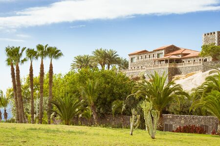 TENERIFE, SPAIN - JANUARY 14, 2013: Plaza Playa del Duque, view of the Duke Castle El Duque Castle, Costa Adeje, Tenerife, Canary Islands, Spainのeditorial素材