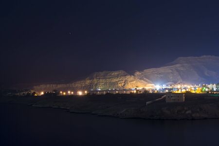 SHARM EL SHEIKH, EGYPT - FEBRUARY 19, 2014: February night in Sharm-El-Sheikh, the red sea coast from the height of the hotel beach Albatros resort, Sharm El Sheikh, Egyptのeditorial素材
