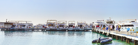 SHARM EL SHEIKH, EGYPT - FEBRUARY 25, 2014: Marina: Pleasure sightseeing boats on the Parking lot of boat Park, boat trip for tourists, Sharm El Sheikh, Egyptのeditorial素材