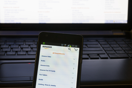 SAINT-PETERSBURG, RUSSIA - DECEMBER 20, 2015: Home page of online ecommerce marketplace Amazon.com - the largest online seller. Open the mobile web page on the smartphone, Saint-Petersburg, Russiaのeditorial素材