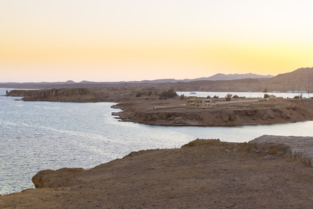 SHARM EL SHEIKH, EGYPT - FEBRUARY 28, 2014: Sunset at mount Sinai, views of the Bay and Islands from height, red sea coast from hotel beach Albatros resort, Sharm El Sheikh, Egyptのeditorial素材