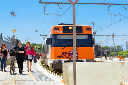 Blanes, Spain - 31 may, 2018: Intercity electric train, Blanes train station. Developed transport infrastructure in coastal resorts Spain. Costa Brava, Cataloniaのeditorial素材