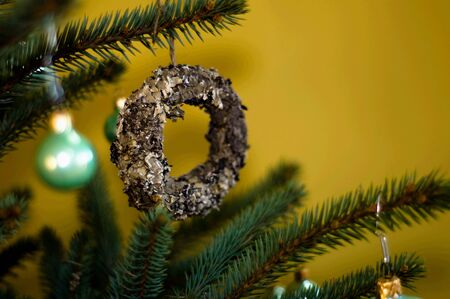 Christmas decoration on the yellow background. 