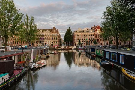 typical view of evening Amsterdam city の写真素材