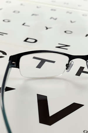 glasses and tables to check the vision level の写真素材