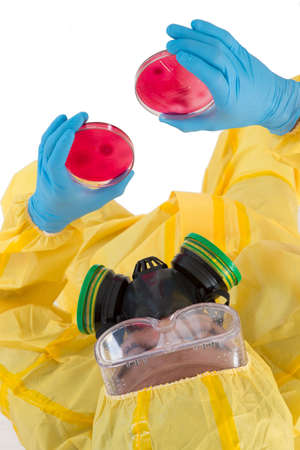 Research laboratory technician with petri dish