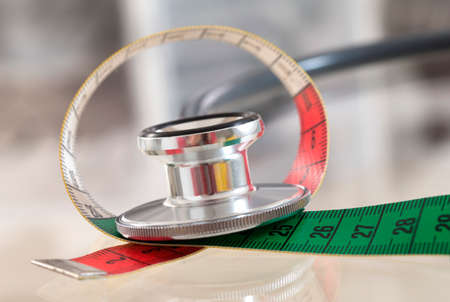 Measuring tape and stethoscopeの写真素材