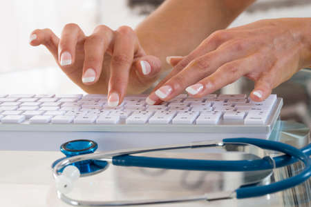 Doctor using computer