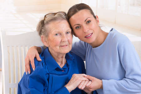 Close-up. Elderly woman and beautiful granddaughter full complicity