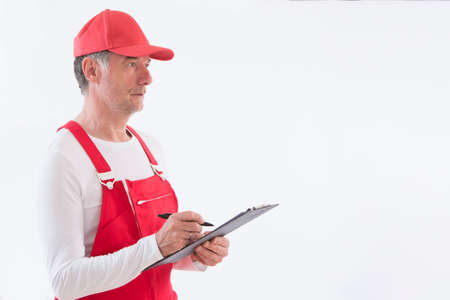 craftsman taking notesの写真素材