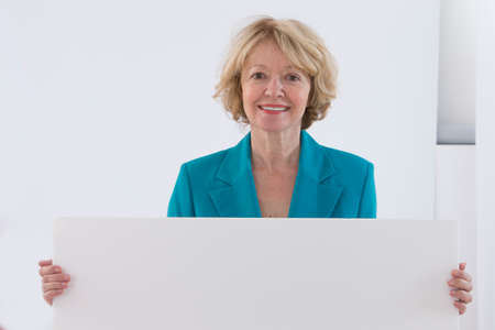 Smiling mature blond womanの写真素材