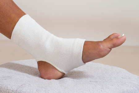 Compression stabilizer ankle. Foot injury, compression bandageの写真素材