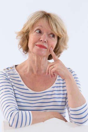 Portrait of a smiling senior woman positive thinkingの写真素材