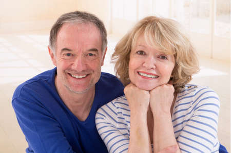 Happy seniors couple in love. Healthy teeth