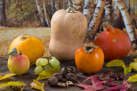 Fruit and vegetables over  autumn backgroundの写真素材