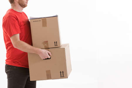 deliverer holding parcels to deliver