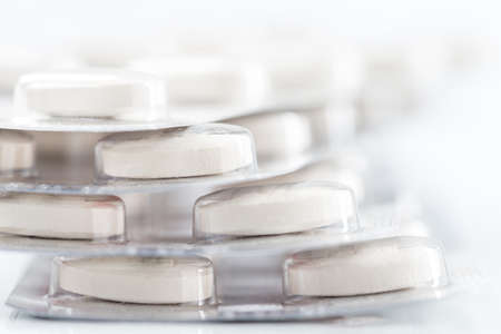 pile of prescription medicines in blistersの写真素材