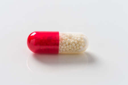 image of medicine pills white and red
