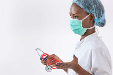 African American female doctor isolated on white backgroundの写真素材
