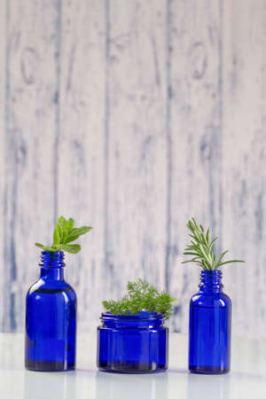 Various Aromatic essential oil  in blue bottleの写真素材