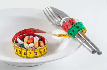 Image of tablets on a plate preparde as a mealの写真素材