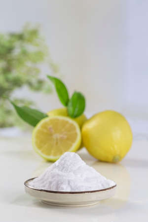 baking soda sodium bicarbonate and lemon for many usesの写真素材