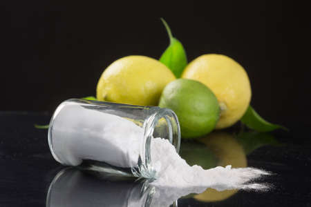 baking soda sodium bicarbonate Medicinal and household Uses on black bachgroundの写真素材