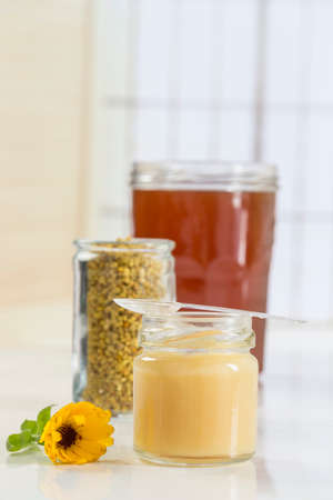 bee pollen with Royal gelly and honey in glass jarの写真素材