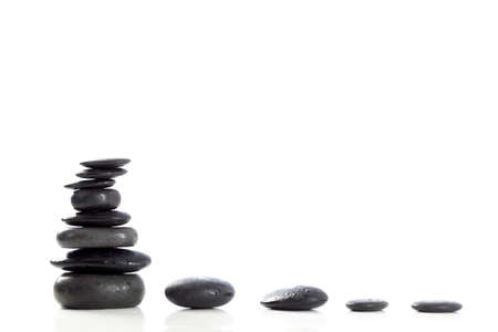 Spa stones pyramid composition isolated on whiteの写真素材