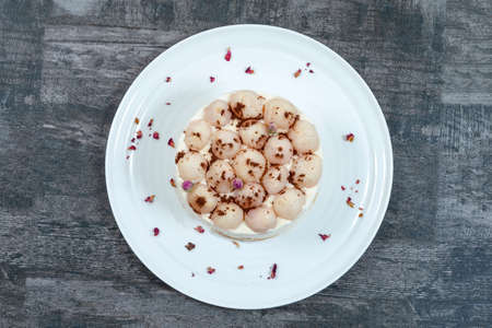 Fresh litchi macaroon cake with custard rose fraganceの写真素材