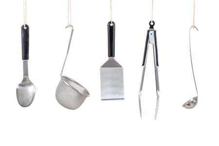 Professional kitchen utensils on white background top view
