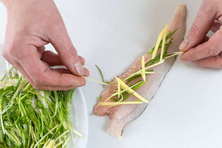 Delicious Fillet of merlan prepareed with cives and gingerの写真素材